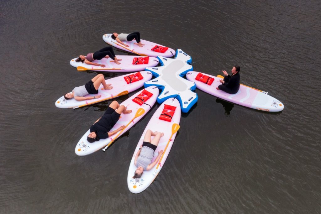 Paddleboard yoga class